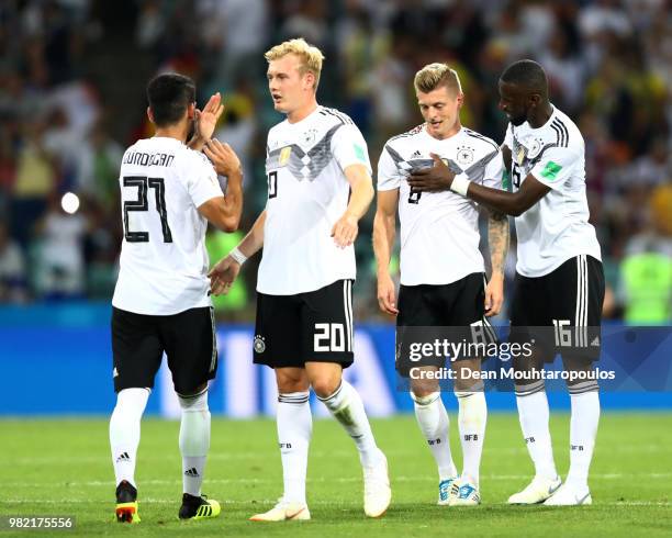 Ilkay Guendogan, Julian Brandt, Toni Kroos and Antonio Ruediger of Germany celebrate following the 2018 FIFA World Cup Russia group F match between...