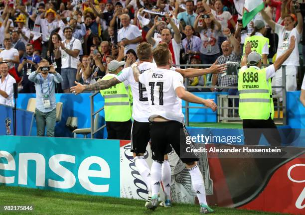 Toni Kroos of Germany celebrates with teammate Marco Reus of Germany after scoring his sides winning goal during the 2018 FIFA World Cup Russia group...
