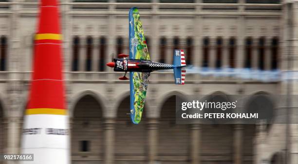 Petr Kopfstein from Czech Republic manoeuvres his plane at the 2018 Red Bull Air Race World Championship on June 23, 2018 in the Hungarian capital...