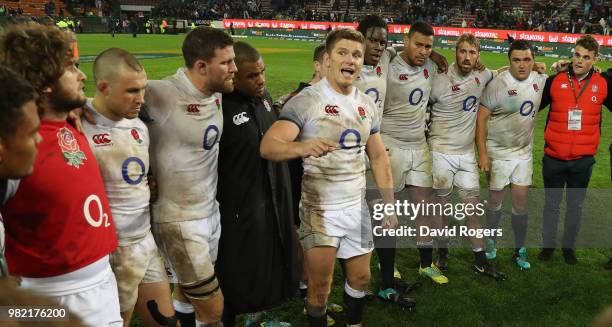 Owen Farrell, the England captain, issues instructions to his team after their victory during the third test match between South Africa and England...