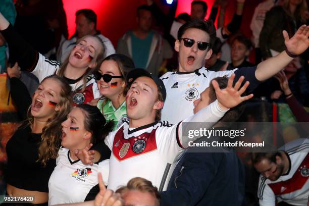 German fans as they watch the Germany national team play in their 2018 FIFA World Cup Russia match against Sweden at 11 Freunde - Die Fussball Arena...