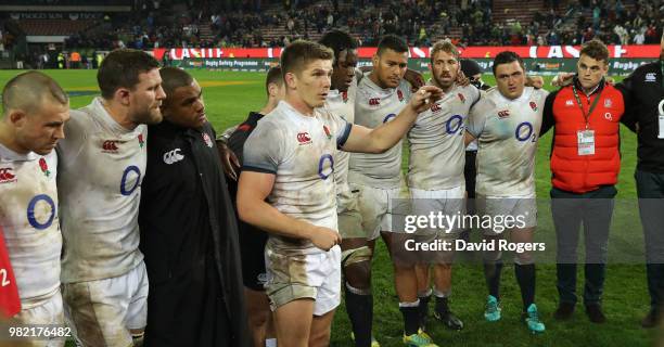 Owen Farrell, the England captain, issues instructions to his team after their victory during the third test match between South Africa and England...