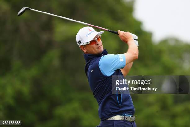 Zach Johnson of the United States plays his shot from the fifth tee during the third round of the Travelers Championship at TPC River Highlands on...