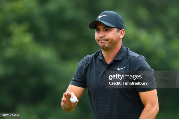 Jason Day of Australia acknowledges the gallery after making a par on the fourth green during the third round of the Travelers Championship at TPC...