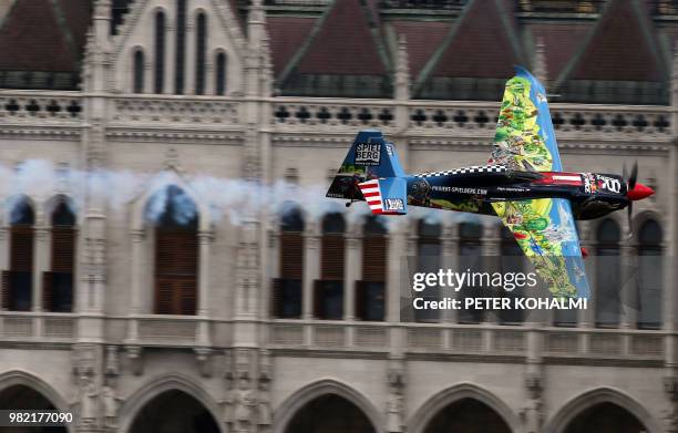 Petr Kopfstein from Czech Republic manoeuvres his plane during the 2018 Red Bull Air Race World Championship on June 23, 2018 in the Hungarian...