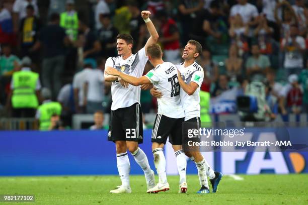 Mario Gomez of Germany, Joshua Kimmich and Thomas Mueller of Germany celebrate at the end of the 2018 FIFA World Cup Russia group F match between...