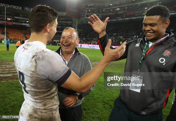 Eddie Jones, the England head coach celebrates wtih Ben Youngs and Nathan Earle after their victory during the third test match between South Africa...