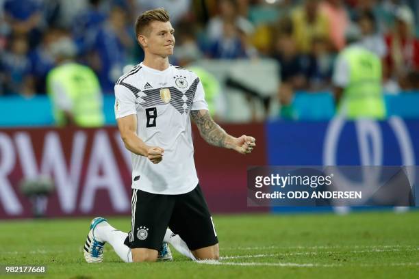 Germany's midfielder Toni Kroos celebrates after winning at the end of the Russia 2018 World Cup Group F football match between Germany and Sweden at...
