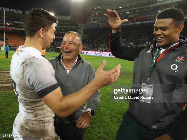 Eddie Jones, the England head coach celebrates wtih Ben Youngs and Nathan Earle after their victory during the third test match between South Africa...