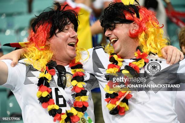 Germany fans celebrate their win during the Russia 2018 World Cup Group F football match between Germany and Sweden at the Fisht Stadium in Sochi on...