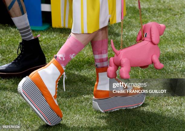 Model presents a creation by Thom Browne, during the Men's Spring/Summer 2019 fashion show on June 23, 2018 in Paris.