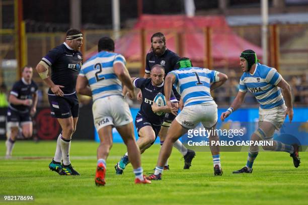 Nick Grigg from Scotland runs with the ball, during their international test match against Argentina, at the Centenario stadium, in Resistencia,...