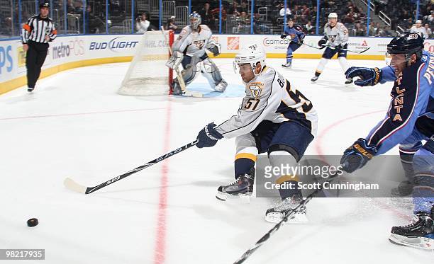 Francois Bouillon of the Nashville Predators defends against Rich Peverley of the Atlanta Thrashers at Philips Arena on March 9, 2010 in Atlanta,...