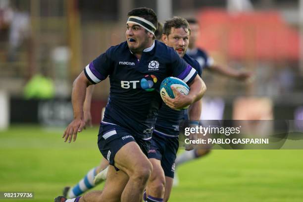 Stuart McInally from Scotland runs with the ball, during their international test match against Argentina, at the Centenario stadium, in Resistencia,...