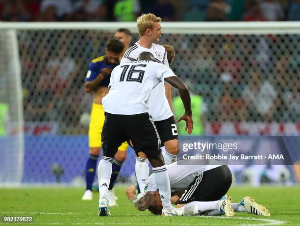 Antonio Rudiger of Germany celebrates with his team-mates at the end of the 2018 FIFA World Cup Russia group F match between Germany and Sweden at...