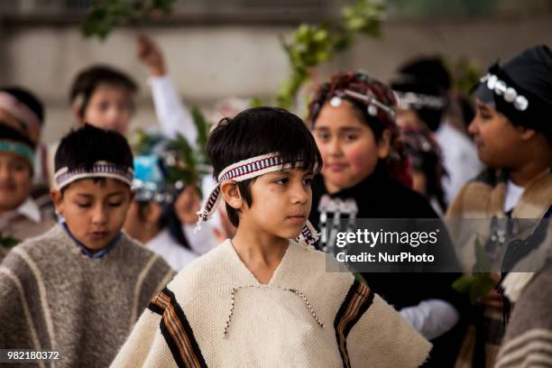 Children participate in the celebration of the Mapuche New Year in Osorno, Chile on 23 June 2018. Children from an intercultural school celebrate the...