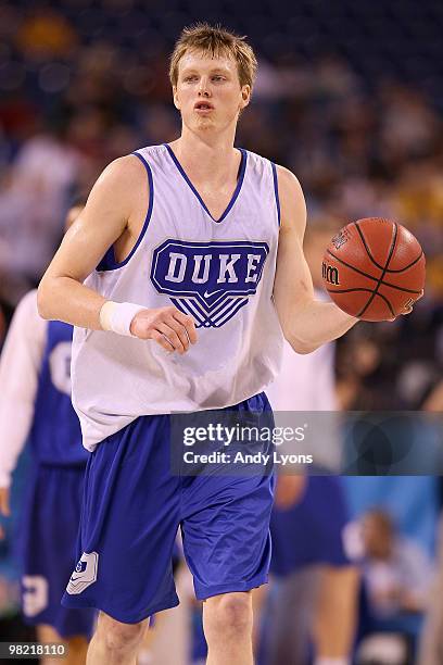 Kyle Singler of the Duke Blue Devils moves the ball during practice prior to the 2010 Final Four of the NCAA Division I Men's Basketball Tournament...