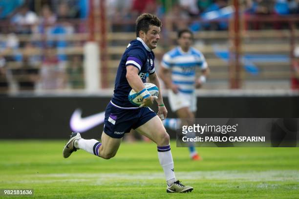 George Horne from Scotland, runs with the ball, during their international test match against Argentina, at the Centenario stadium, in Resistencia,...