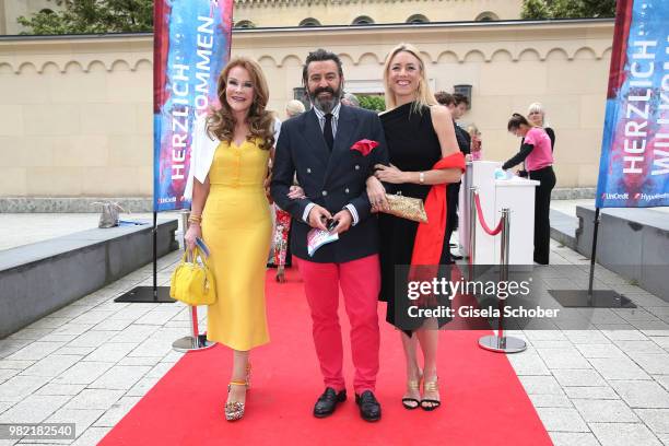 Ulrike Huebner, Painter Mauro Bergonzoli and his partner Franziska Fugger-Babenhausen during the reception of the '17. UniCredit Festspiel-Nacht' at...