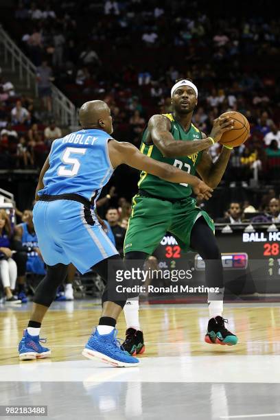 DeShawn Stevenson of Ball Hogs handles the ball as Cuttino Mobley of Power defends during week one of the BIG3 three on three basketball league at...