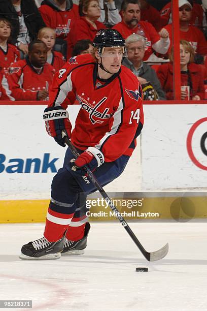 Toams Fleischmann of the Washington Capitals skates with the puck during a NHL hockey game against the Calgary Flames on March 28, 2010 at the...