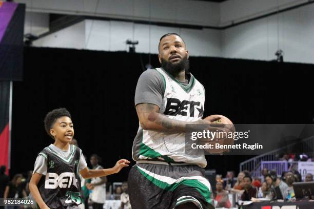 Miles Brown and The Game play basketball at the Celebrity Basketball Game Sponsored By Sprite during the 2018 BET Experience at Los Angeles...