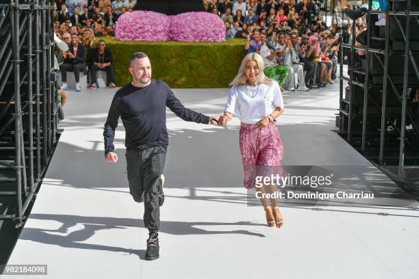 Kim Jones and guest walk the runway during the Dior Homme Menswear Spring/Summer 2019 show as part of Paris Fashion Week on June 23, 2018 in Paris,...