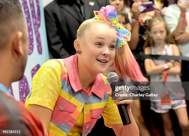 Social Influencer, Nickelodeon Star JoJo Siwa at Nickelodeon's booth at 2018 VidCon at Anaheim Convention Center on June 23, 2018 in Anaheim,...