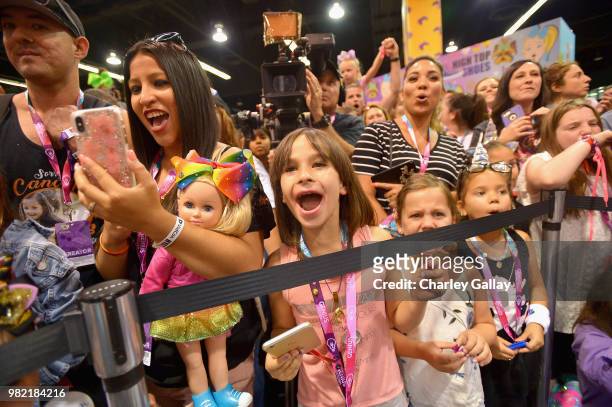 JoJo Siwa fans at Nickelodeon's booth at 2018 VidCon at Anaheim Convention Center on June 23, 2018 in Anaheim, California.