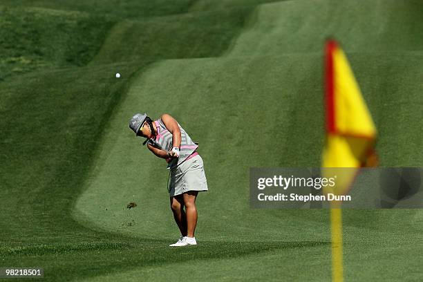 Christina Kim pitches to the green on the second hole during the second round of the Kraft Nabisco Championship at Mission Hills Country Club on...