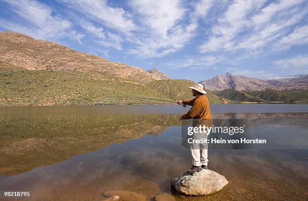 flyfishing in keurom dam, worcester, western cape province, south africa - western cape province stock-fotos und bilder