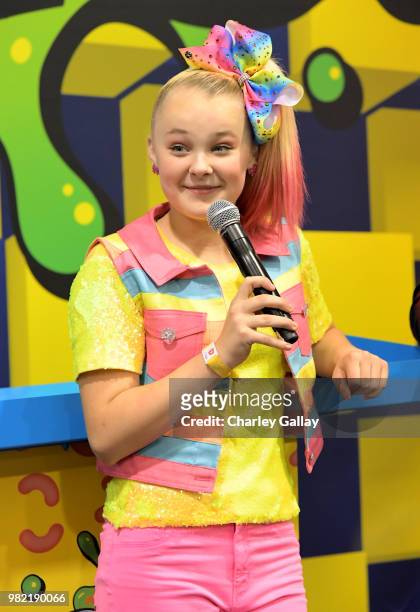 Social Influencer, Nickelodeon Star JoJo Siwa at Nickelodeon's booth at 2018 VidCon at Anaheim Convention Center on June 23, 2018 in Anaheim,...