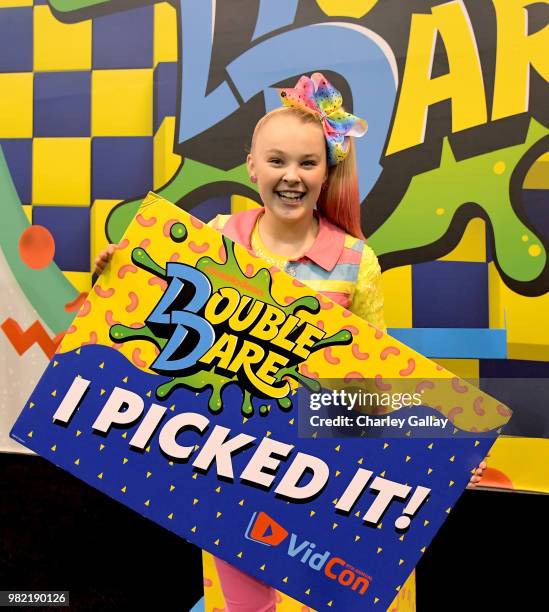 Social Influencer, Nickelodeon Star JoJo Siwa at Nickelodeon's booth at 2018 VidCon at Anaheim Convention Center on June 23, 2018 in Anaheim,...