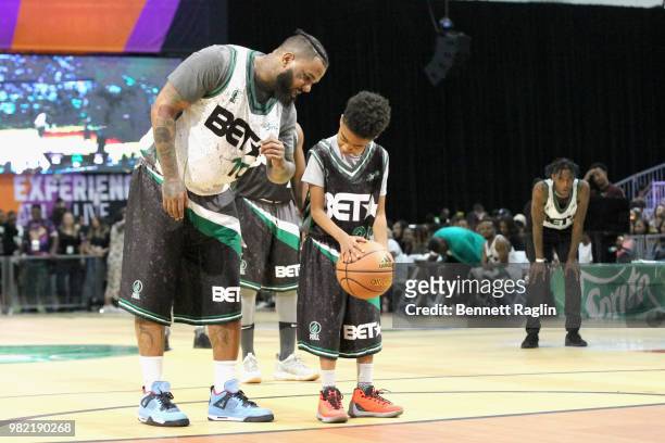 The Game and Miles Brown play basketball at the Celebrity Basketball Game Sponsored By Sprite during the 2018 BET Experience at Los Angeles...