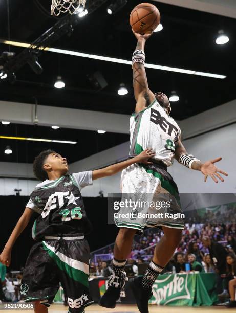 Miles Brown and YFN Lucci play basketball at the Celebrity Basketball Game Sponsored By Sprite during the 2018 BET Experience at Los Angeles...