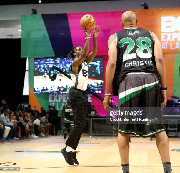 Famous Dex and Doug Christie play basketball at the Celebrity Basketball Game Sponsored By Sprite during the 2018 BET Experience at Los Angeles...