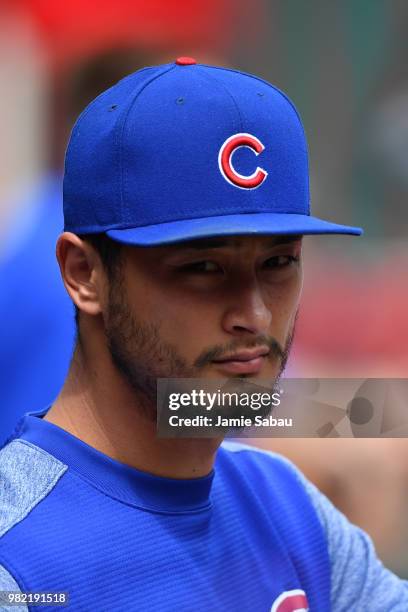 Yu Darvish of the Chicago Cubs watches from the dugout in the first inning as his team plays against the Cincinnati Reds at Great American Ball Park...