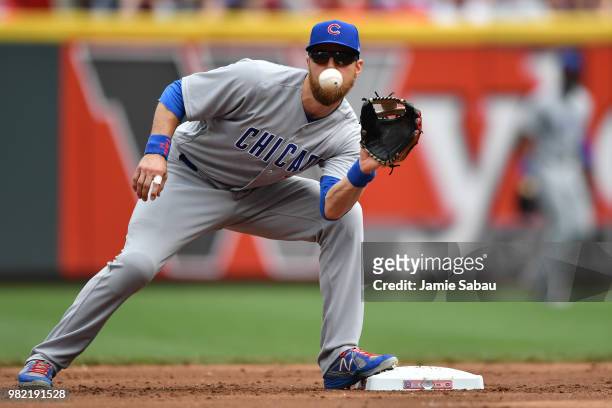 Ben Zobrist of the Chicago Cubs takes the throw at second base for a force out in the second inning against the Cincinnati Reds at Great American...