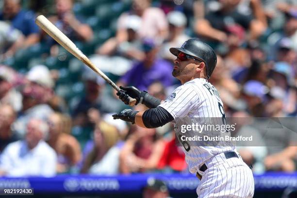 Gerardo Parra of the Colorado Rockies hits a fourth inning RBI sacrifice fly against the Miami Marlins at Coors Field on June 23, 2018 in Denver,...