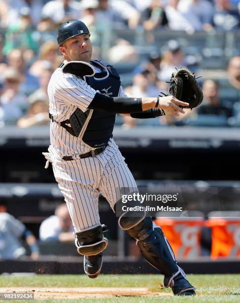 Austin Romine of the New York Yankees in action against the Seattle Mariners at Yankee Stadium on June 21, 2018 in the Bronx borough of New York...