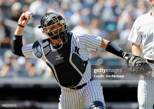 Austin Romine of the New York Yankees in action against the Seattle Mariners at Yankee Stadium on June 21, 2018 in the Bronx borough of New York...