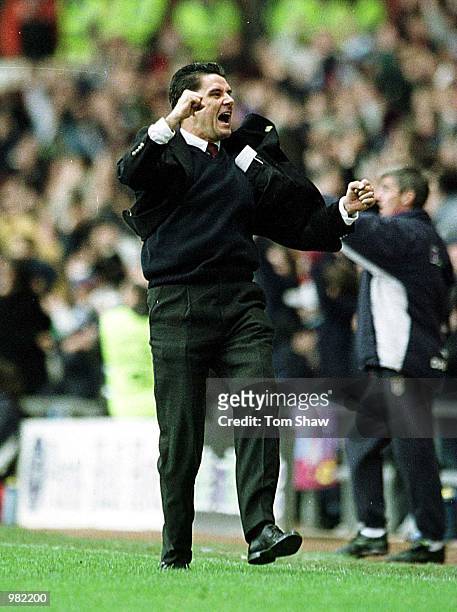 John Gregory, the Aston Villa manager, celebrates the winning goal during the match between Aston Villa v Everton in the FA Carling Premiership at...