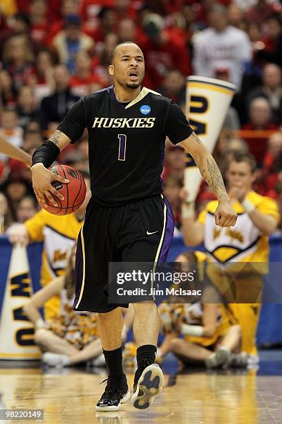 Venoy Overton of the Washington Huskies reacts against the West Virginia Mountaineers during the east regional semifinal of the 2010 NCAA men's...