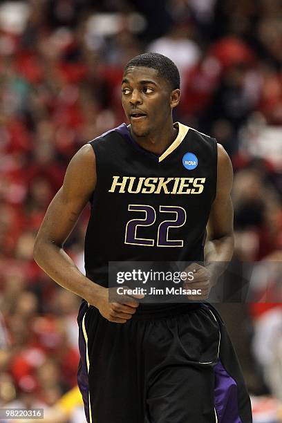 Justin Holiday of the Washington Huskies runs up court against the West Virginia Mountaineers during the east regional semifinal of the 2010 NCAA...