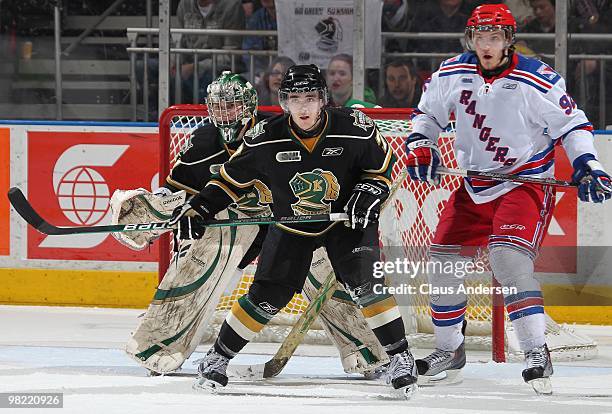 Matt Ashman of the London Knights defends in the first game of the second round of the 2010 playoffs against the Kitchener Rangers on April 1, 2010...