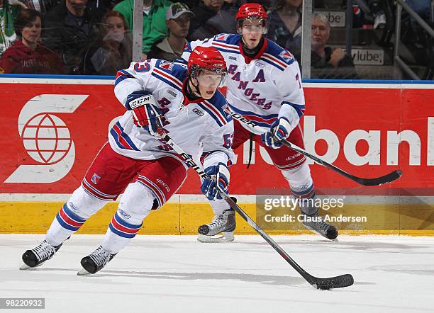 Jeff Skinner of the Kitchener Rangers skates with the puck in the first game of the second round of the 2010 playoffs against the London Knights on...