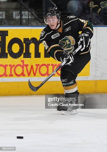 Jared Knight of the London Knights fires a pass in the first game of the second round of the 2010 playoffs against the Kitchener Rangers on April 1,...