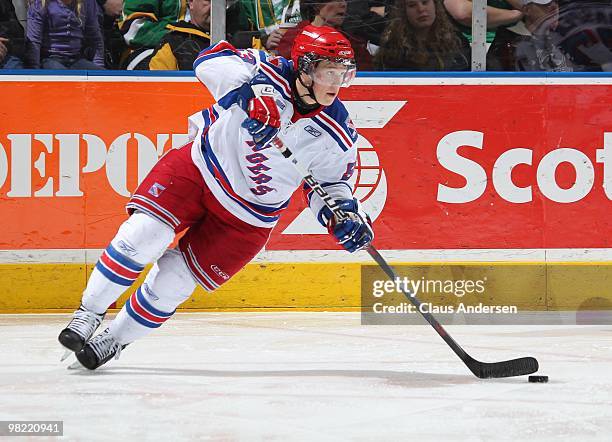 Jeff Skinner of the Kitchener Rangers skates with the puck in the first game of the second round of the 2010 playoffs against the London Knights on...