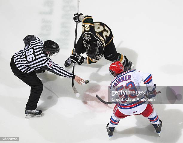 Jeff Skinner of the Kitchener Rangers gets set to take a faceoff against Chris DeSousa of the London Knights in the first game of the second round of...
