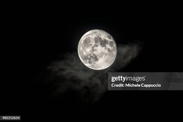 cloudy moon - cappuccio stock pictures, royalty-free photos & images